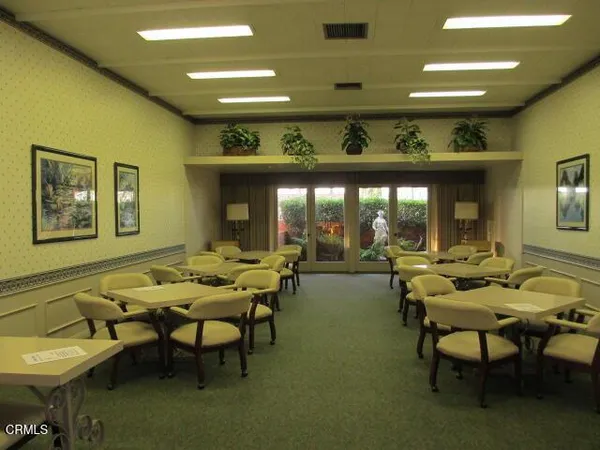 a room with furniture and a large window