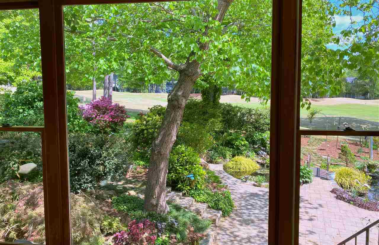 5109 Salem Ridge Road Holly Springs, NC 27540 - Photo 1 of 30 Watch the golfers go by and enjoy the amazing views from the sitting area of the family room. View from Sitting Area