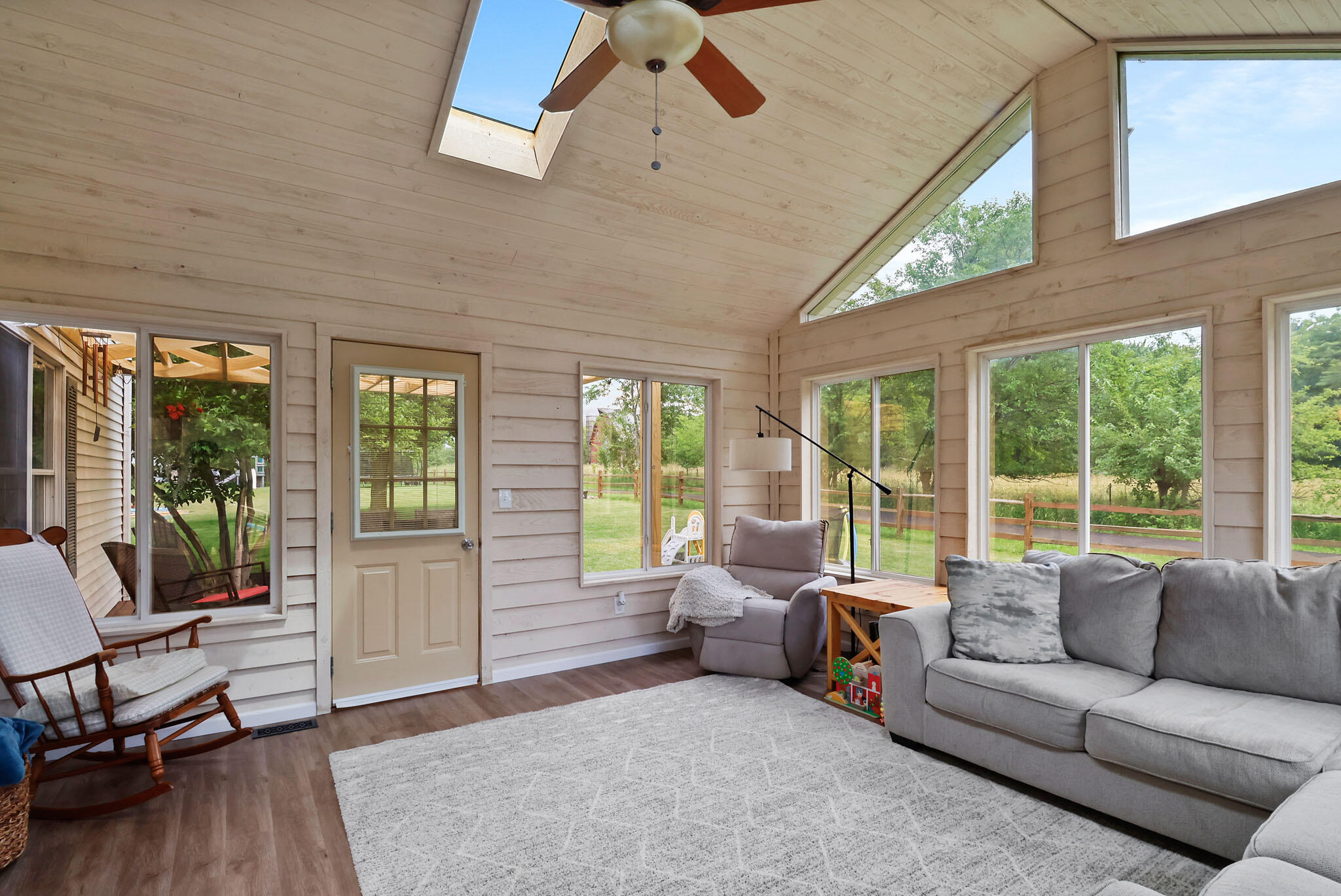 1353 Cobblestone Drive Valparaiso, IN 46385 - Photo 16 of 35 a living room with furniture and large windows