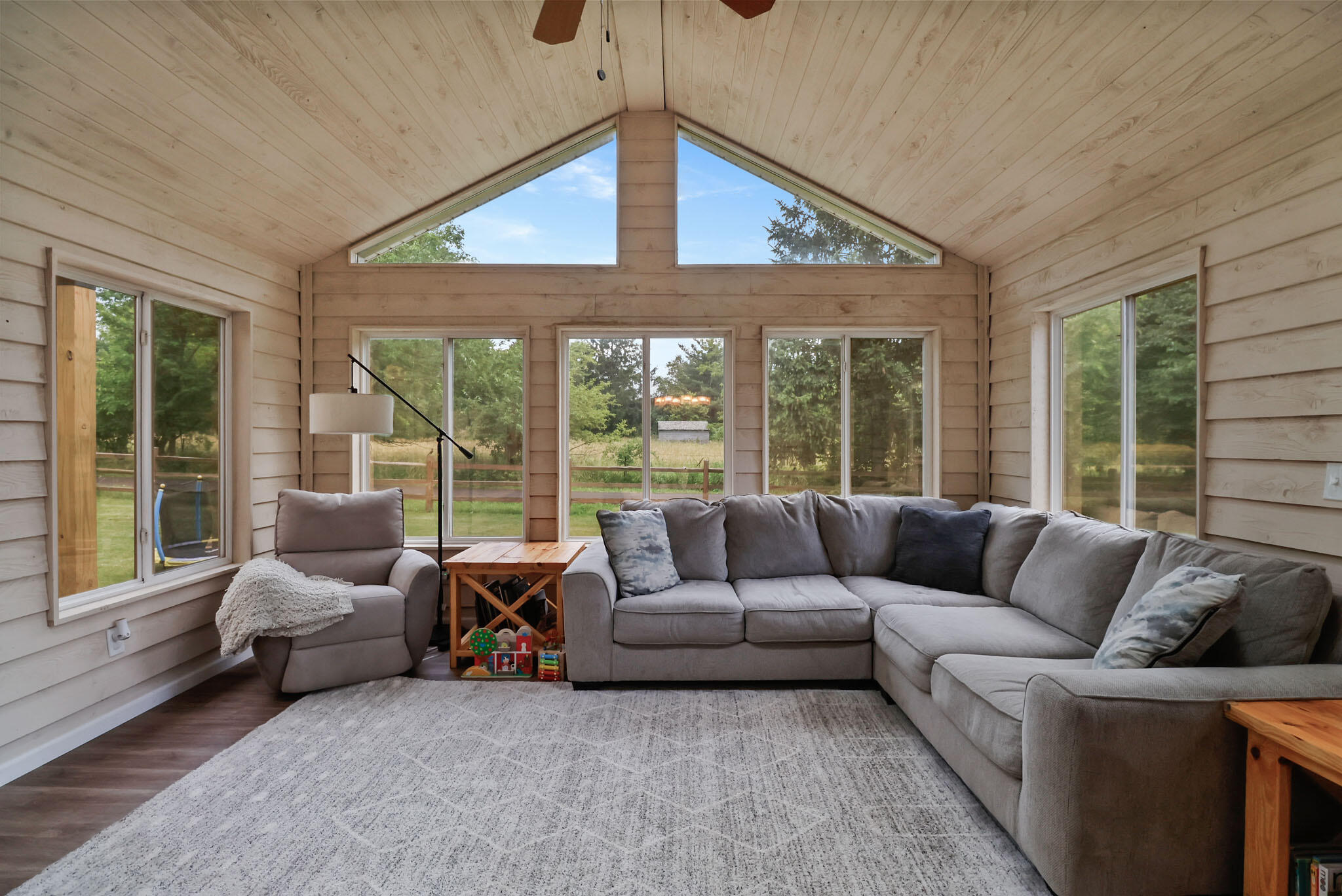 1353 Cobblestone Drive Valparaiso, IN 46385 - Photo 17 of 35 a living room with furniture and a large window