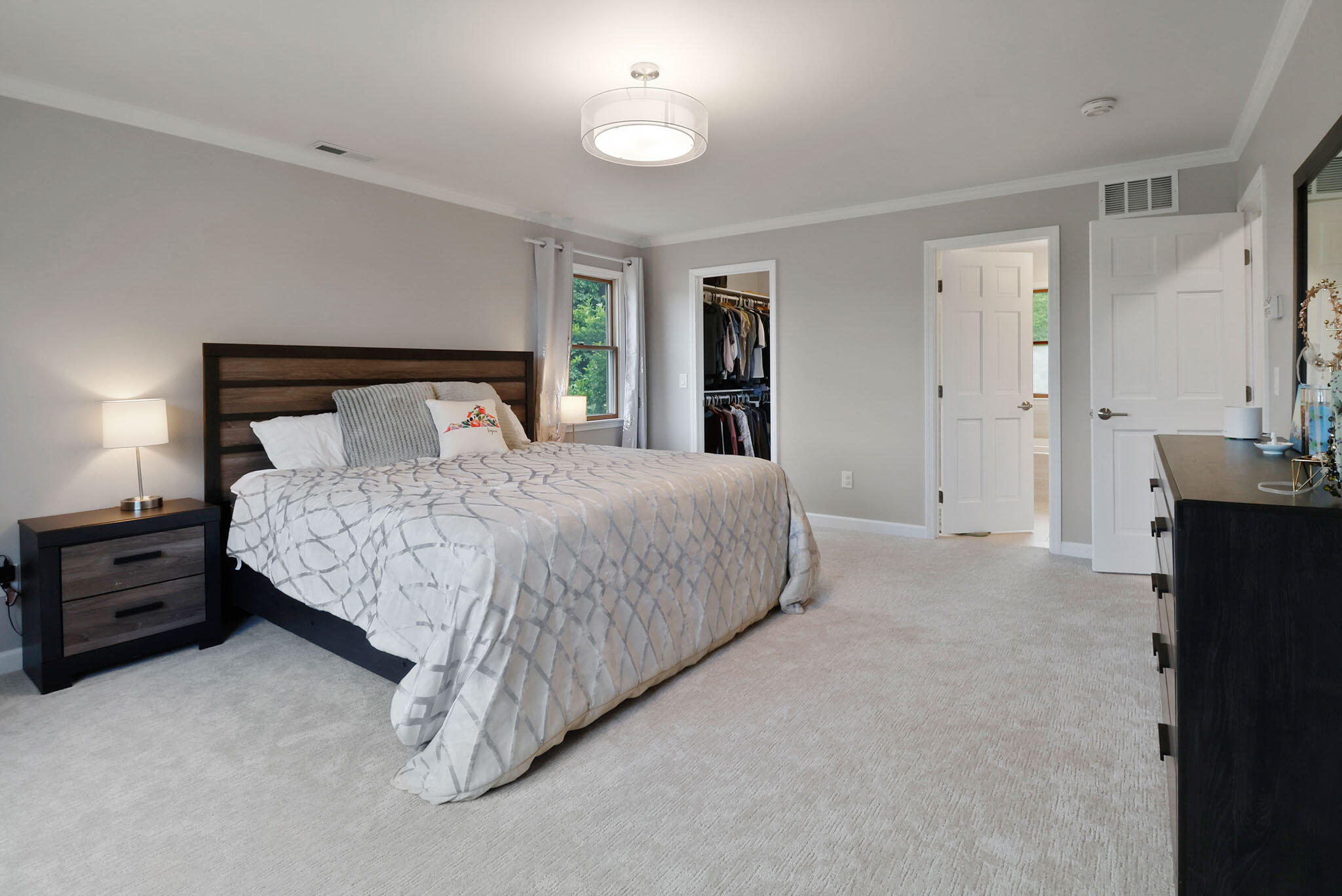 1353 Cobblestone Drive Valparaiso, IN 46385 - Photo 20 of 35 a bedroom with a bed and a night stand