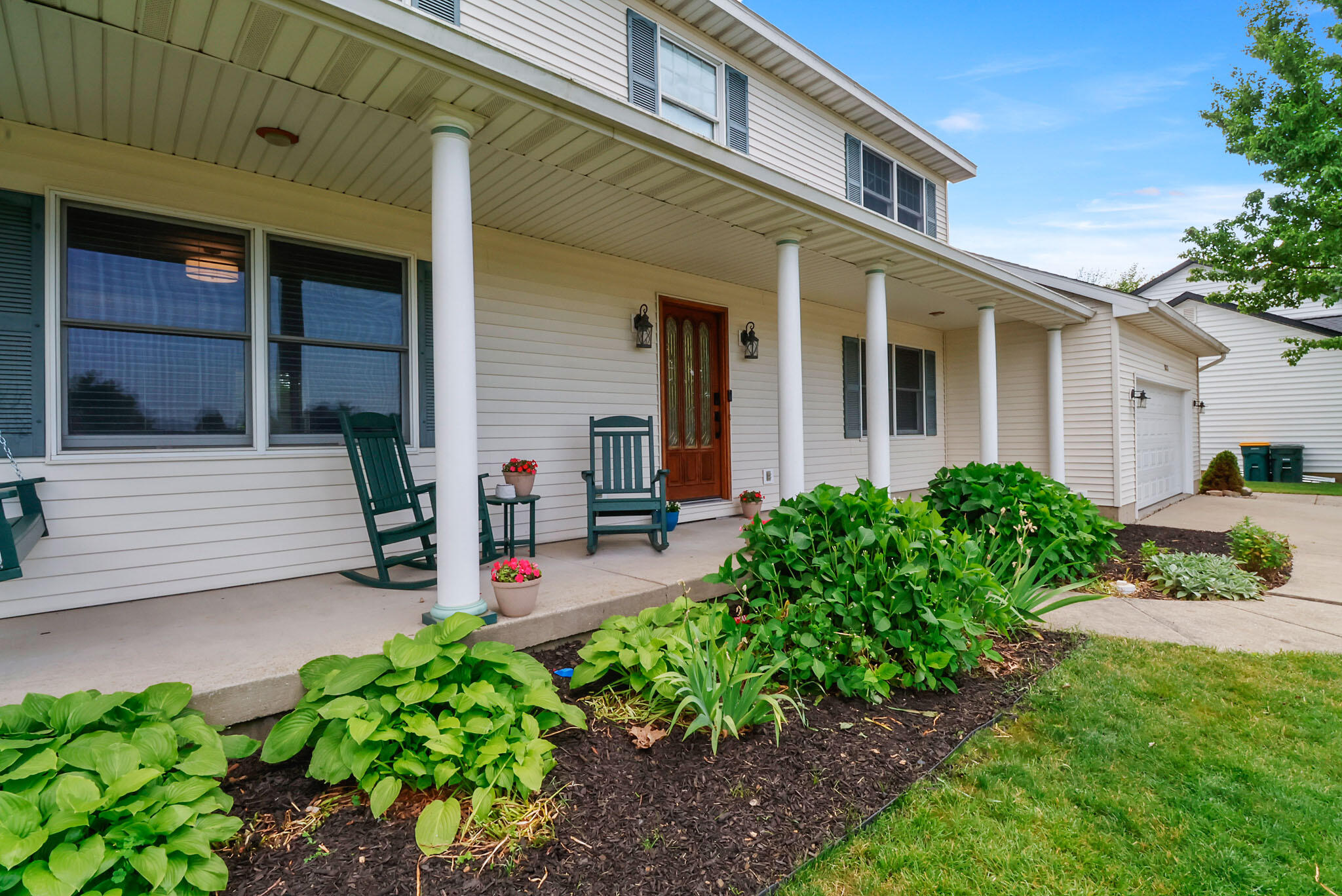 1353 Cobblestone Drive Valparaiso, IN 46385 - Photo 2 of 35 front view of a house with a small yard