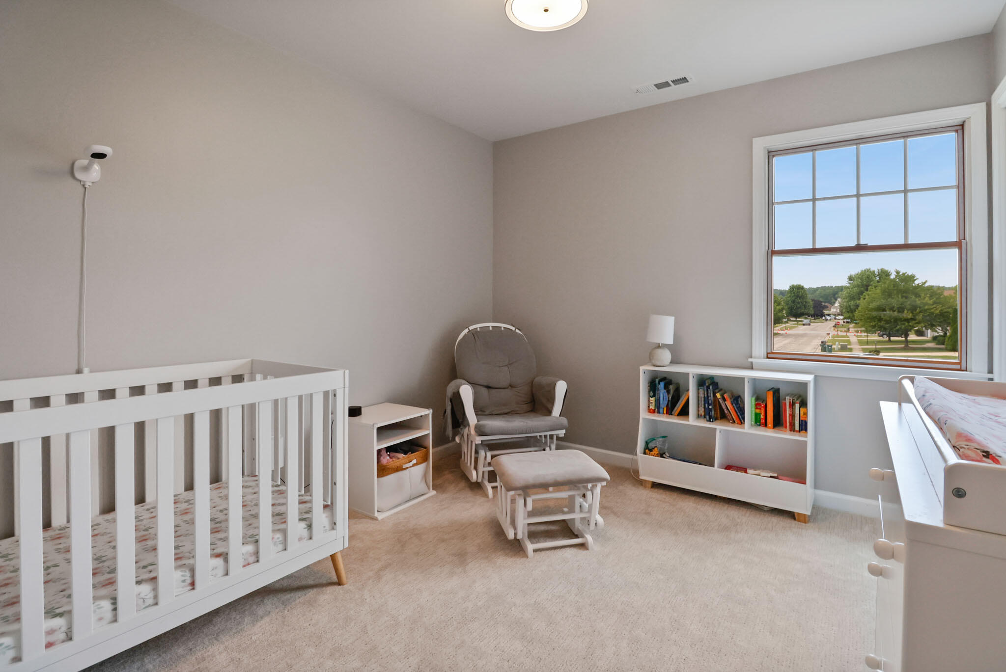 1353 Cobblestone Drive Valparaiso, IN 46385 - Photo 28 of 35 a bedroom with furniture and a window