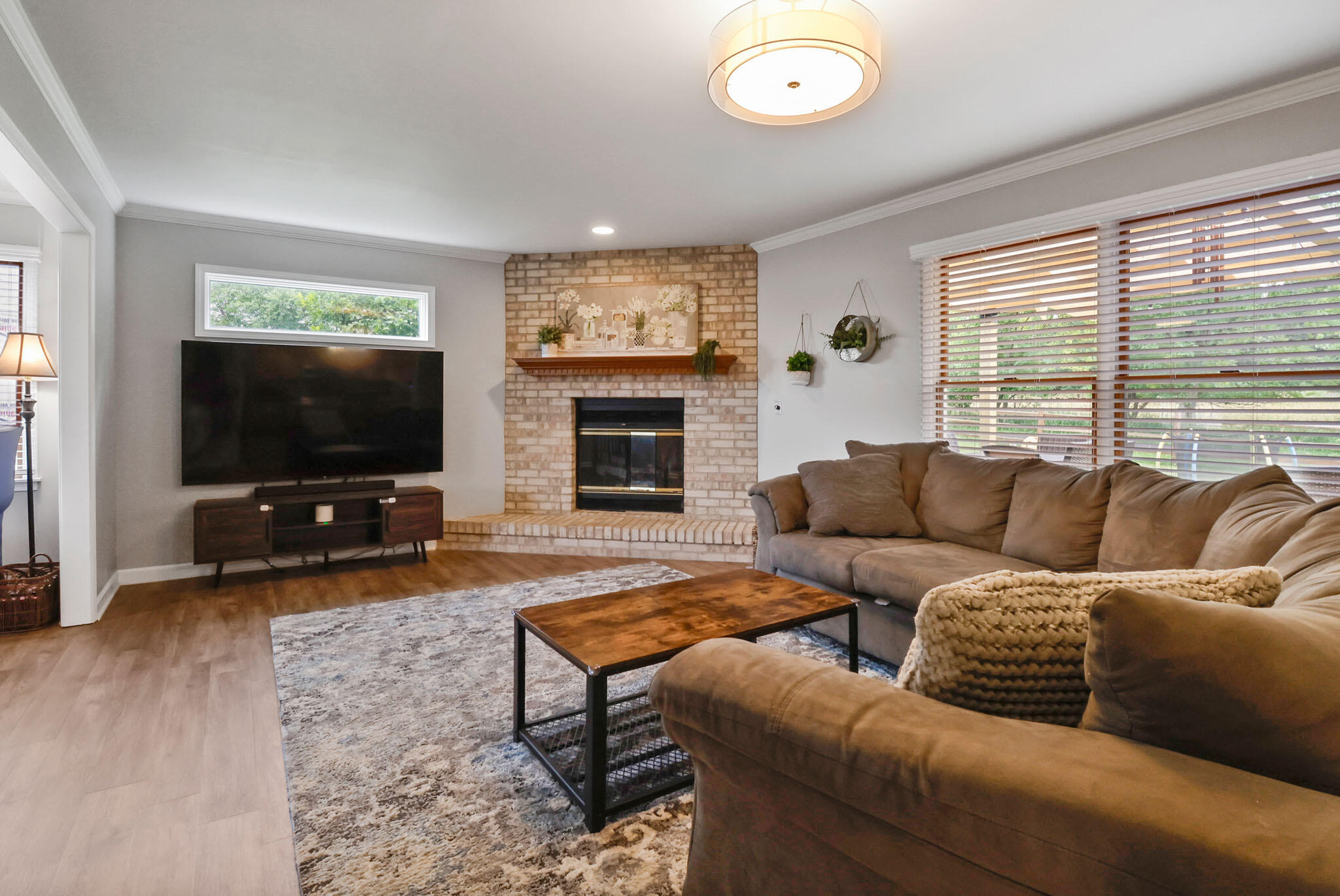1353 Cobblestone Drive Valparaiso, IN 46385 - Photo 5 of 35 a living room with furniture and a flat screen tv