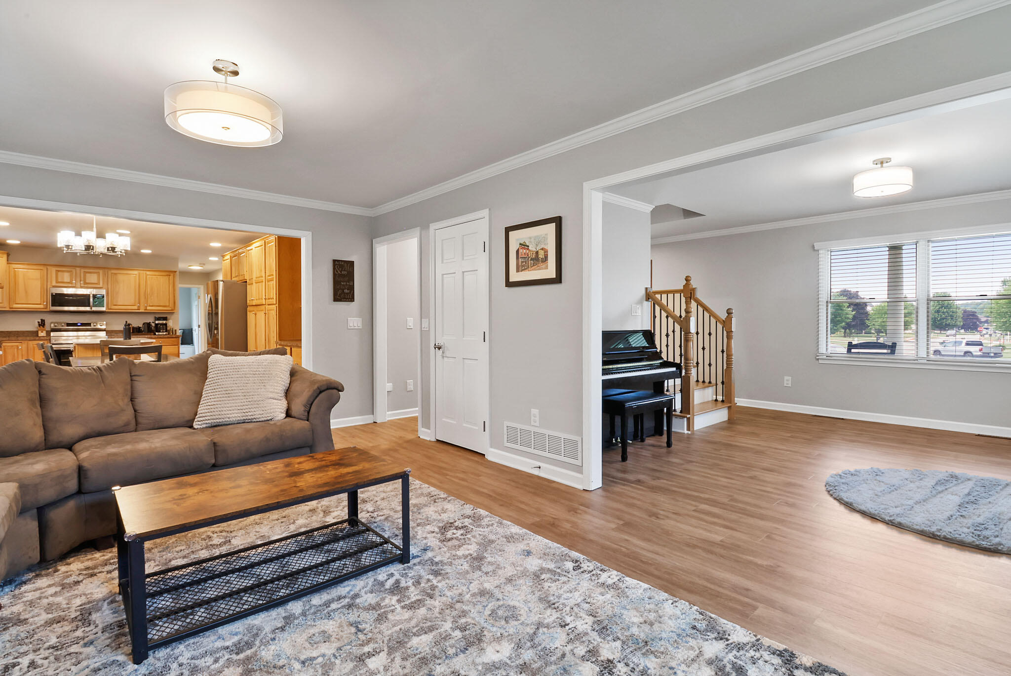 1353 Cobblestone Drive Valparaiso, IN 46385 - Photo 6 of 35 a living room with furniture and wooden floor