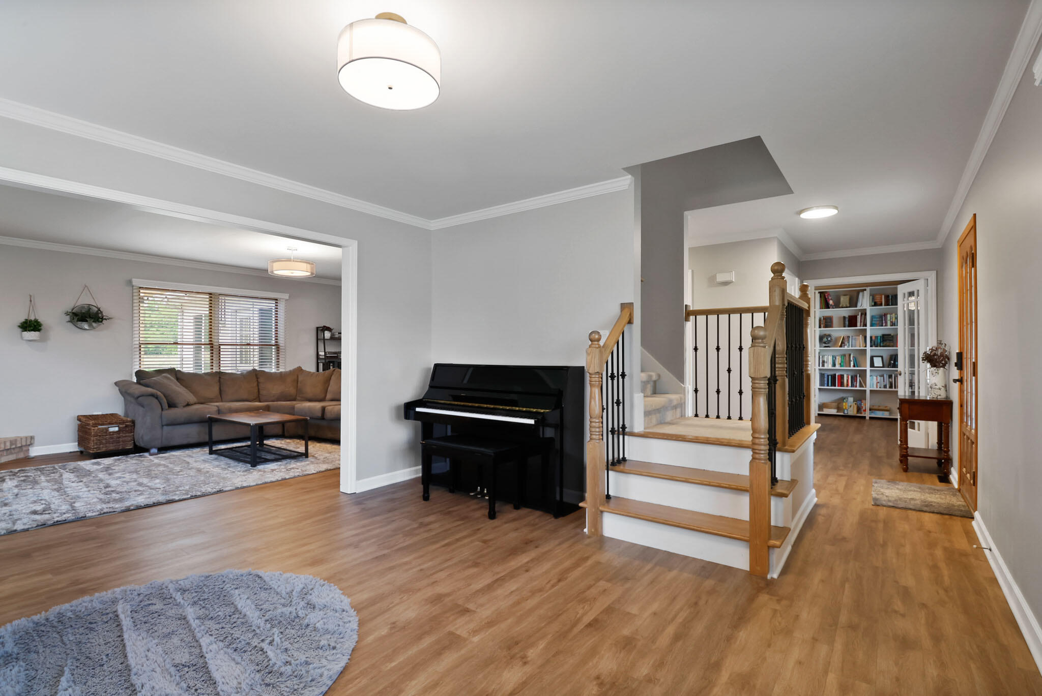 1353 Cobblestone Drive Valparaiso, IN 46385 - Photo 7 of 35 a living room with furniture and wooden floor