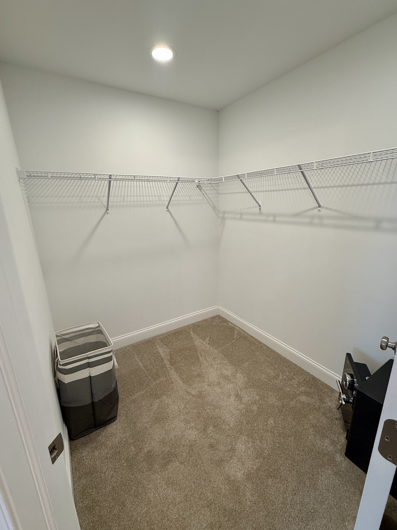 2222 Maggie Lane Sycamore, IL 60178 - Photo 17 of 24 a view of a room with racks on the wall