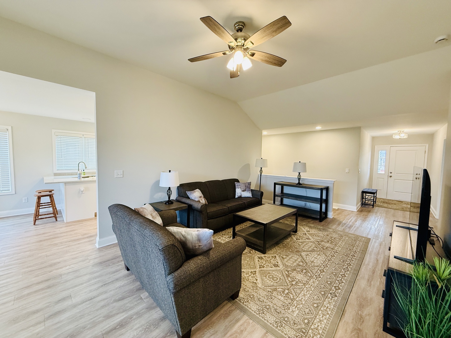 2222 Maggie Lane Sycamore, IL 60178 - Photo 2 of 24 a living room with furniture and a flat screen tv