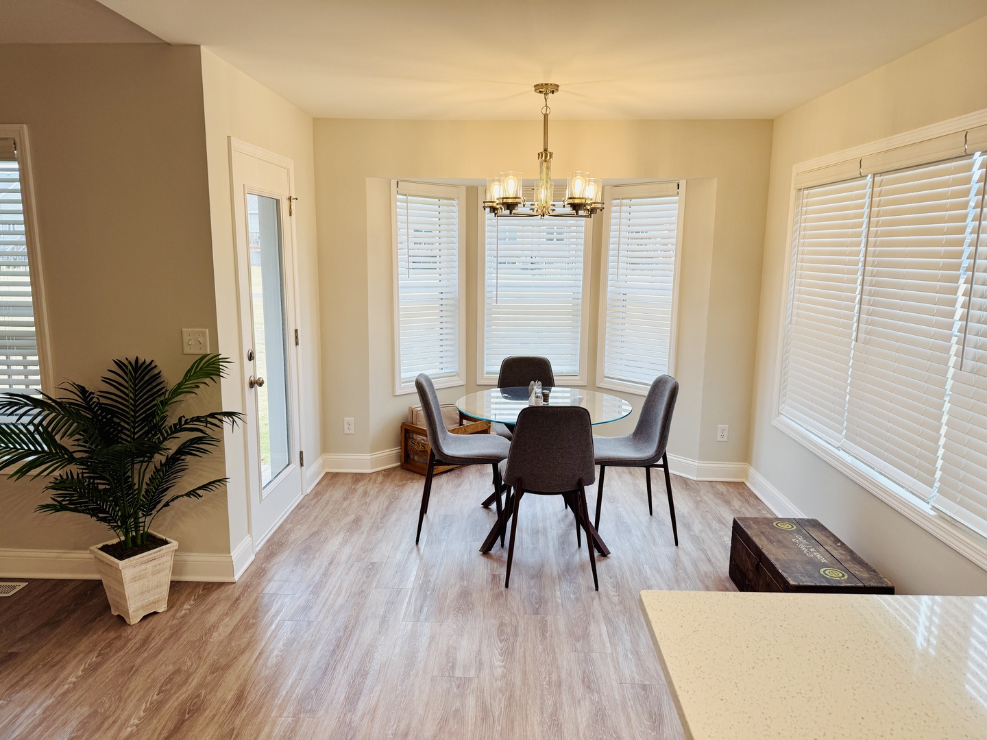 2222 Maggie Lane Sycamore, IL 60178 - Photo 7 of 24 a view of a dining room with furniture window and wooden floor