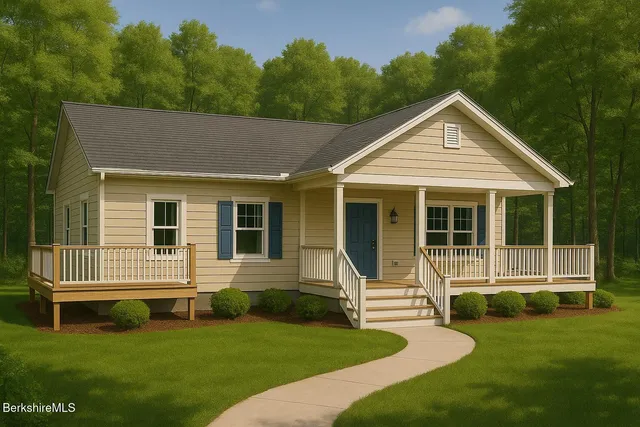 a front view of a house with a garden