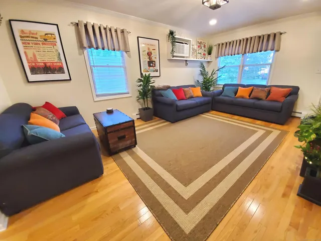 a living room with furniture and a couch