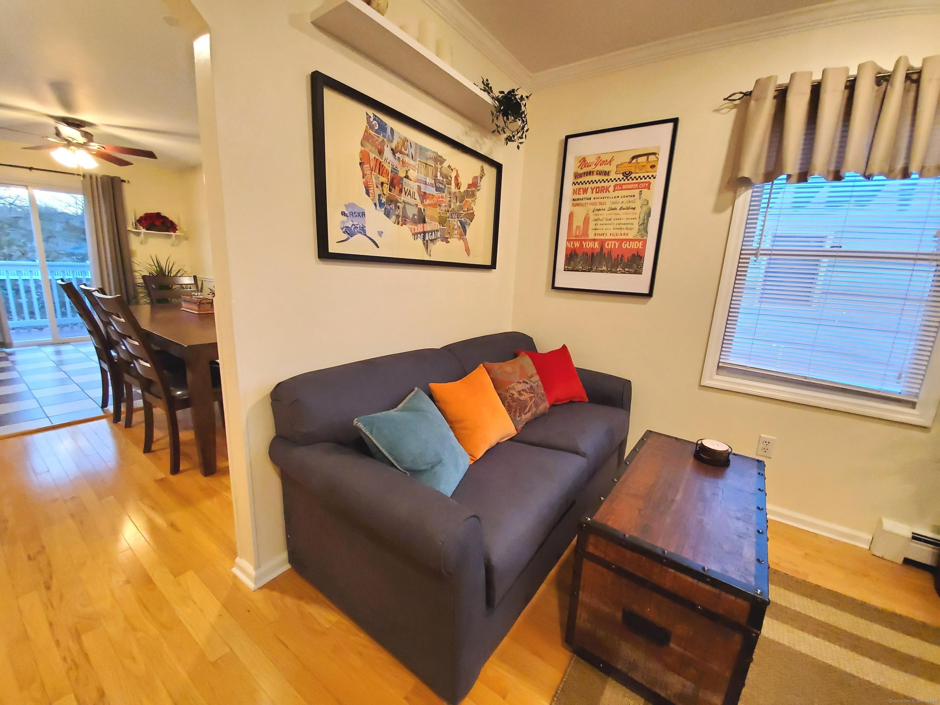 39 Nash Place, Unit A Norwalk, CT 06854 - Photo 4 of 29 a living room with furniture and a wooden floor