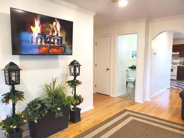 a view of a living room and bathroom