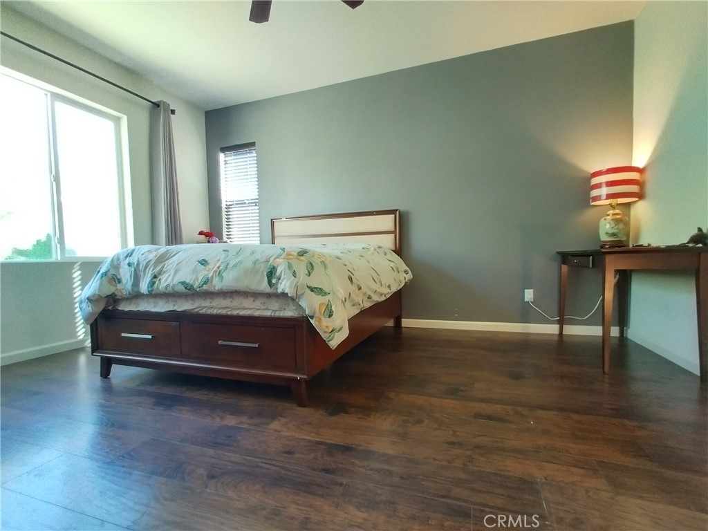 11811 Cramer Road Yucaipa, CA 92399 - Photo 29 of 56 a bedroom with a bed and window