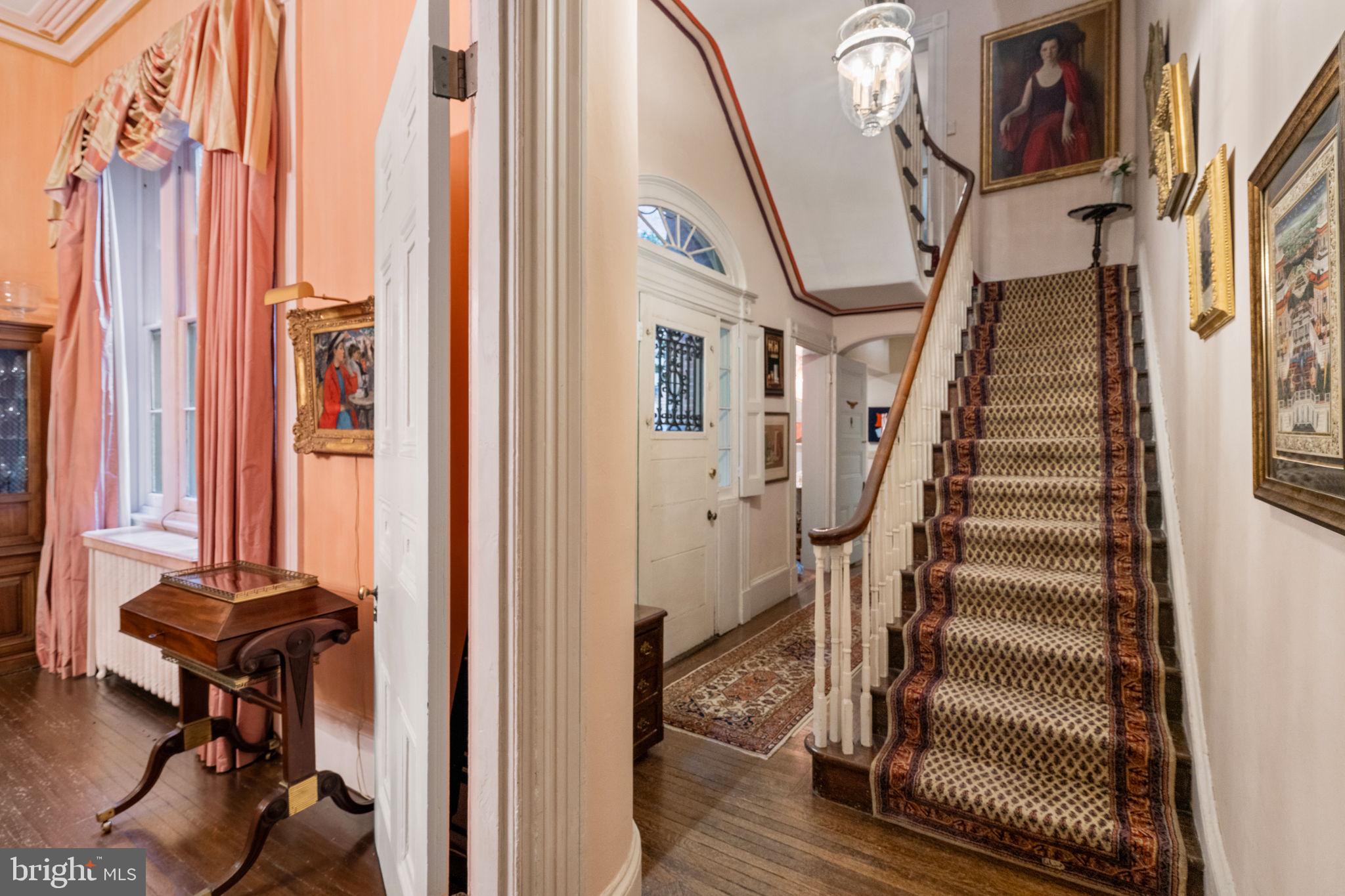 1017 Clinton Street Philadelphia, PA 19107 - Photo 11 of 38 a view of a hallway with wooden floor and entryway