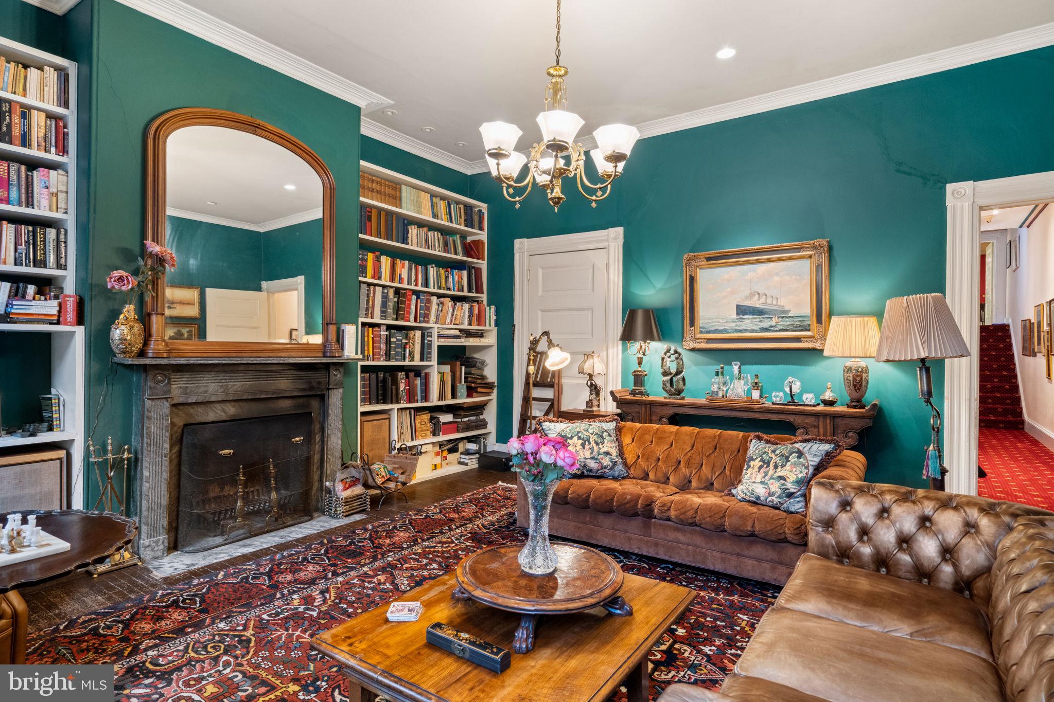 1017 Clinton Street Philadelphia, PA 19107 - Photo 30 of 38 a living room with fireplace furniture and a fireplace