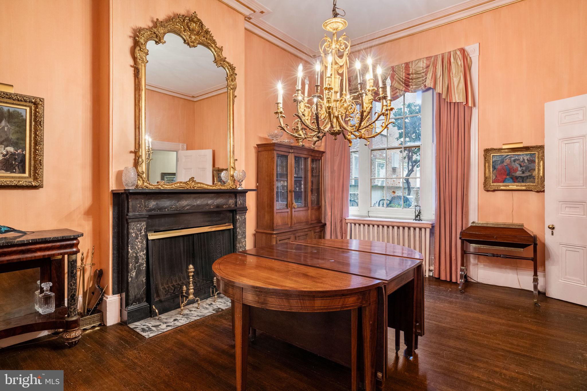 1017 Clinton Street Philadelphia, PA 19107 - Photo 9 of 38 a view of a dining room with furniture window and wooden floor