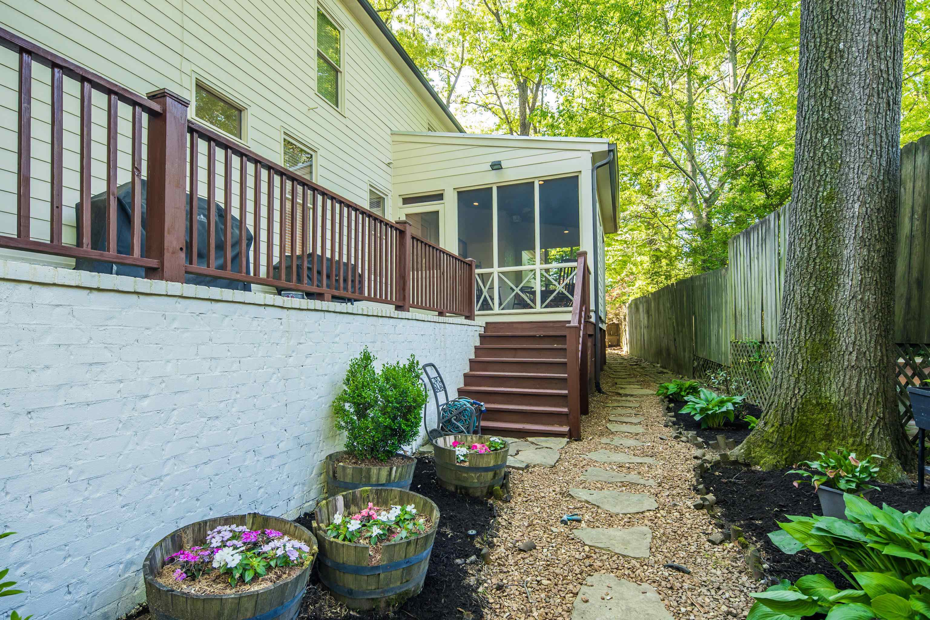 237 Windover Road Memphis, TN 38111 - Photo 37 of 37 Fenced yard with a sunroom and stairs