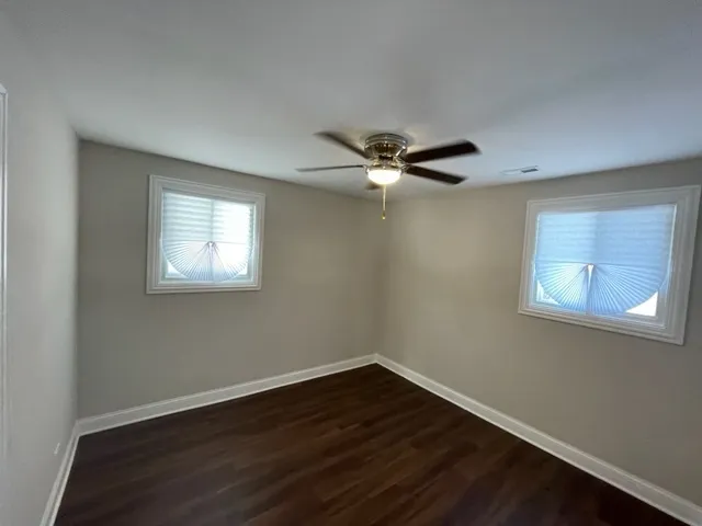 a view of a room that has a window in it