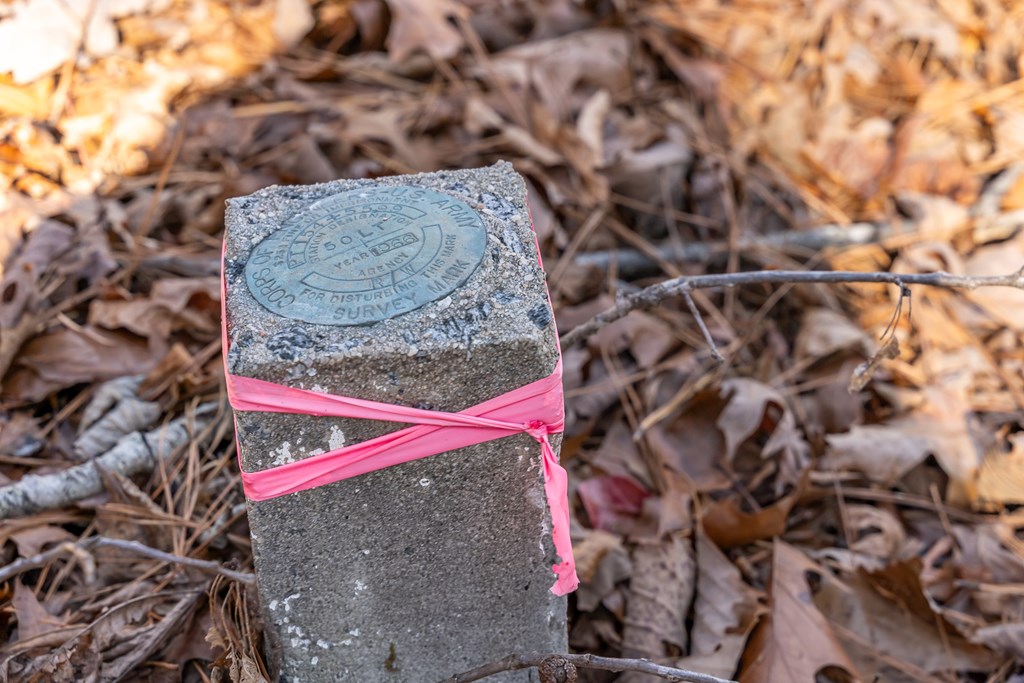 Lot 32 Woodring Branch Road Chatsworth, GA 30705 - Photo 15 of 37 a street sign on a brick wall