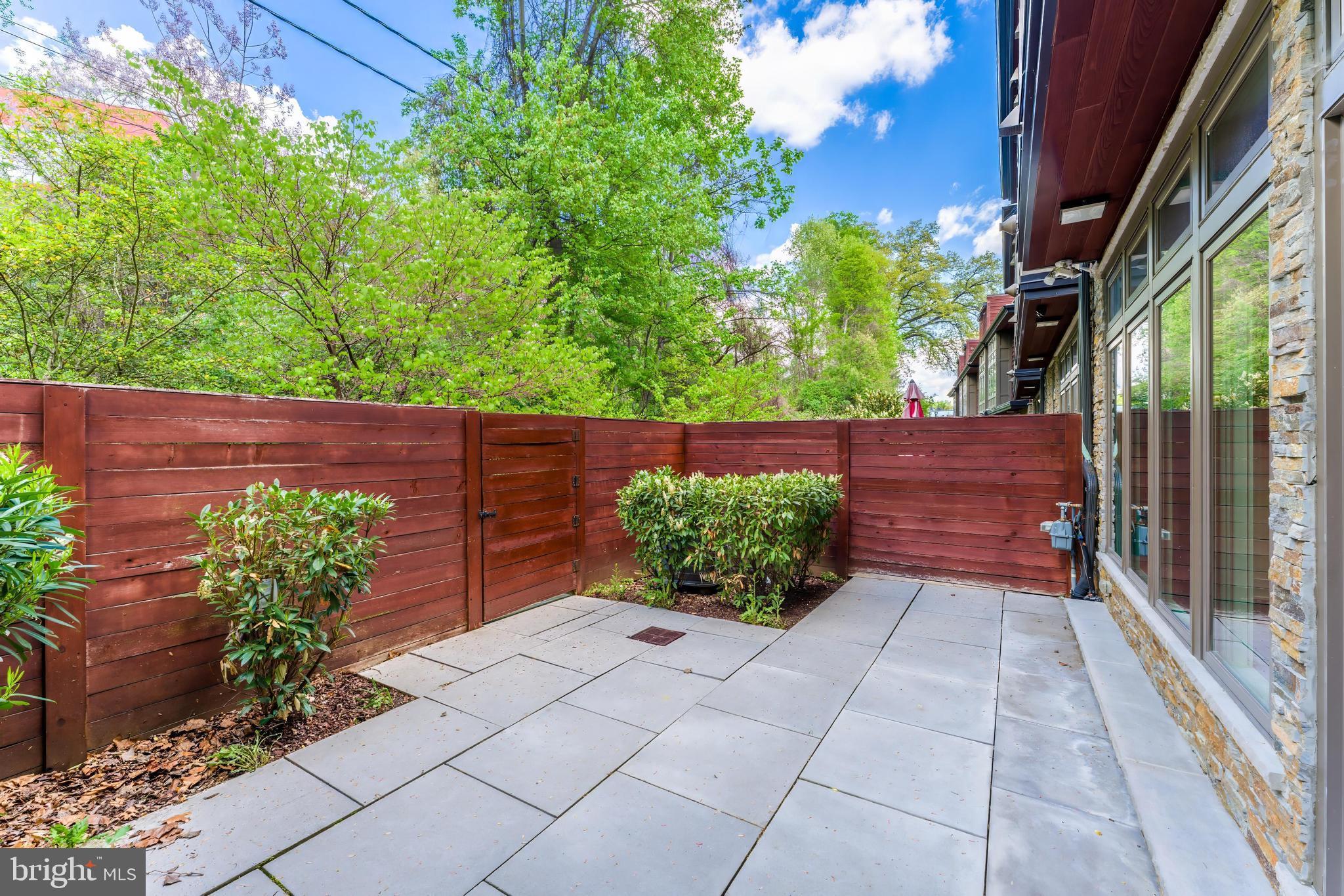 5125 Willet Bridge Road Bethesda, MD 20816 - Photo 12 of 47 a view of a pathway in a garden