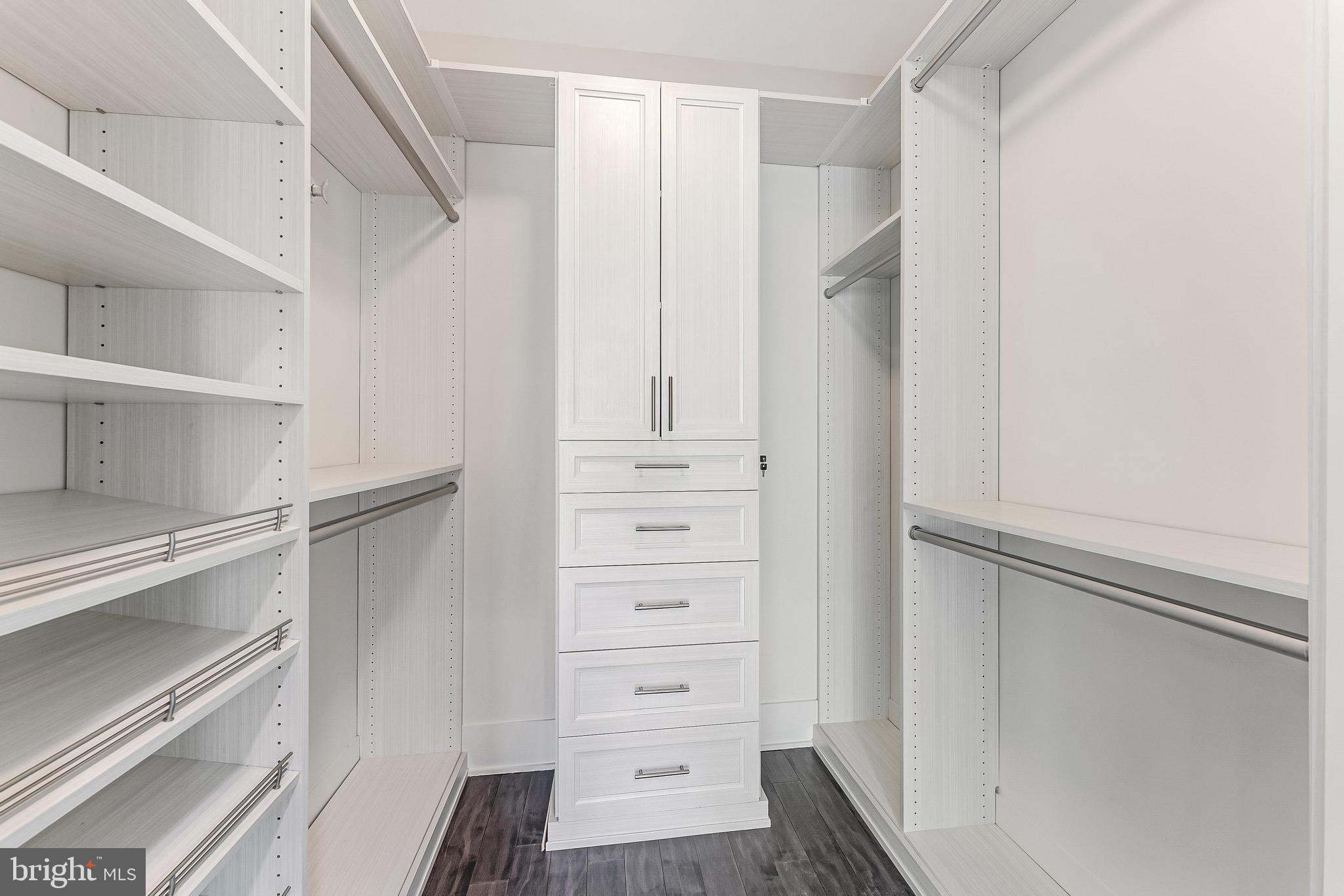 5125 Willet Bridge Road Bethesda, MD 20816 - Photo 24 of 47 a view of walk in closet with empty racks