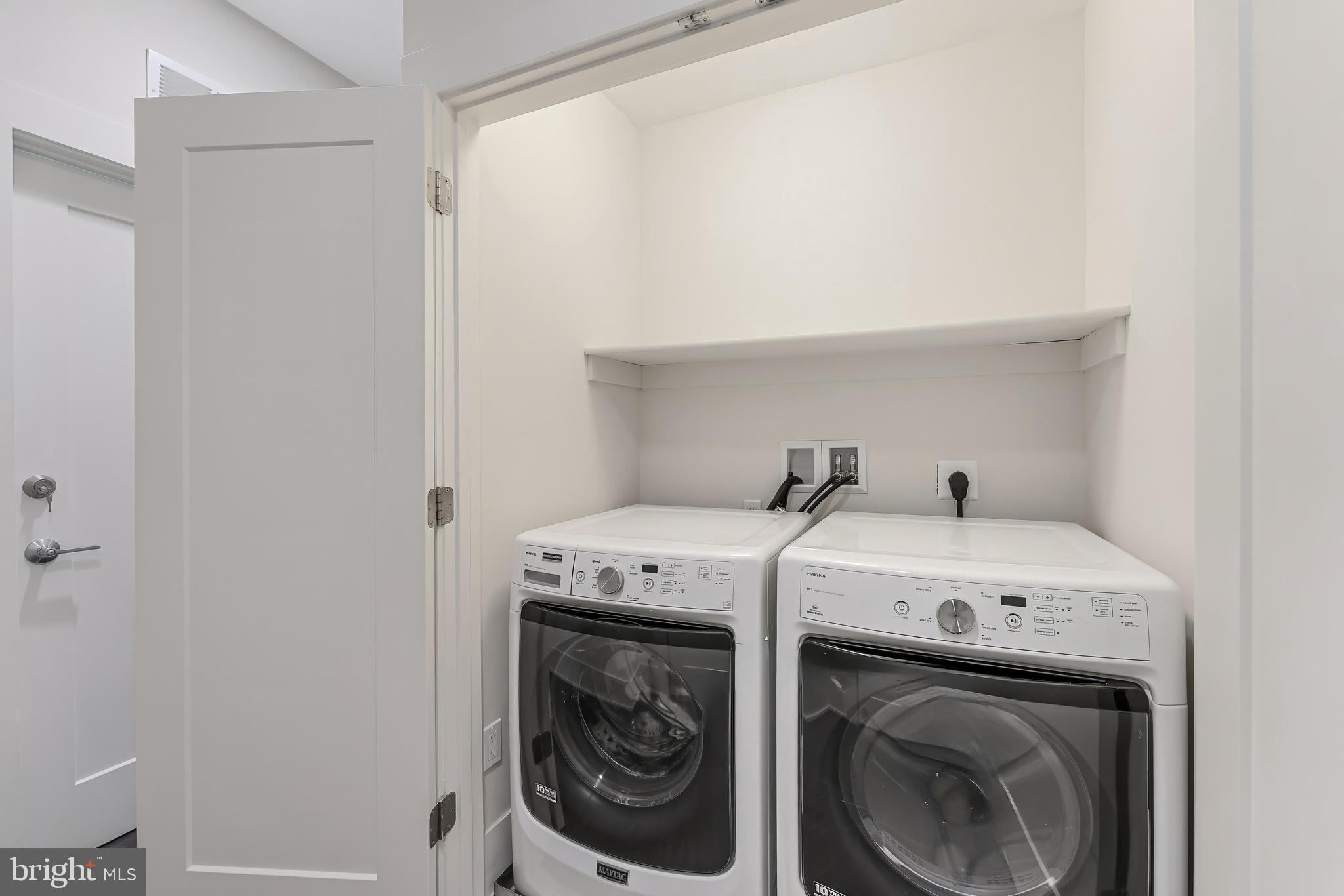 5125 Willet Bridge Road Bethesda, MD 20816 - Photo 29 of 47 a utility room with dryer and washer