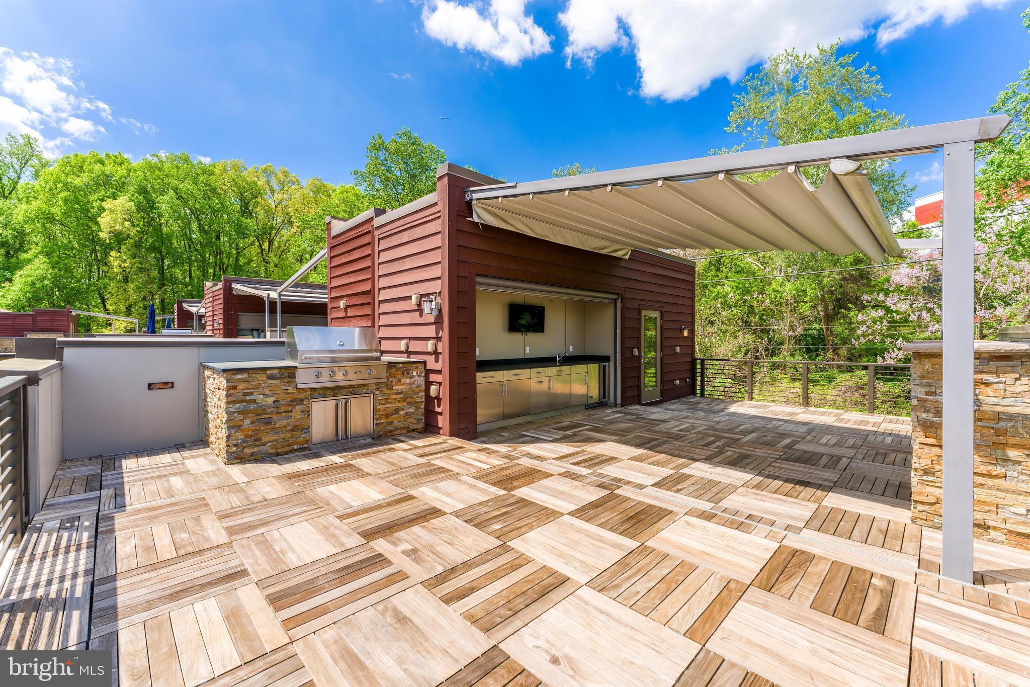 5125 Willet Bridge Road Bethesda, MD 20816 - Photo 35 of 47 a view of a house with a patio
