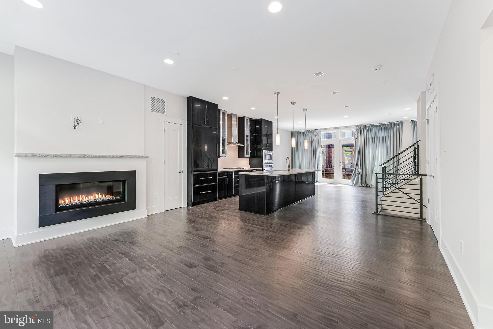 5125 Willet Bridge Road Bethesda, MD 20816 - Photo 5 of 47 a view of kitchen with cabinets and wooden floor