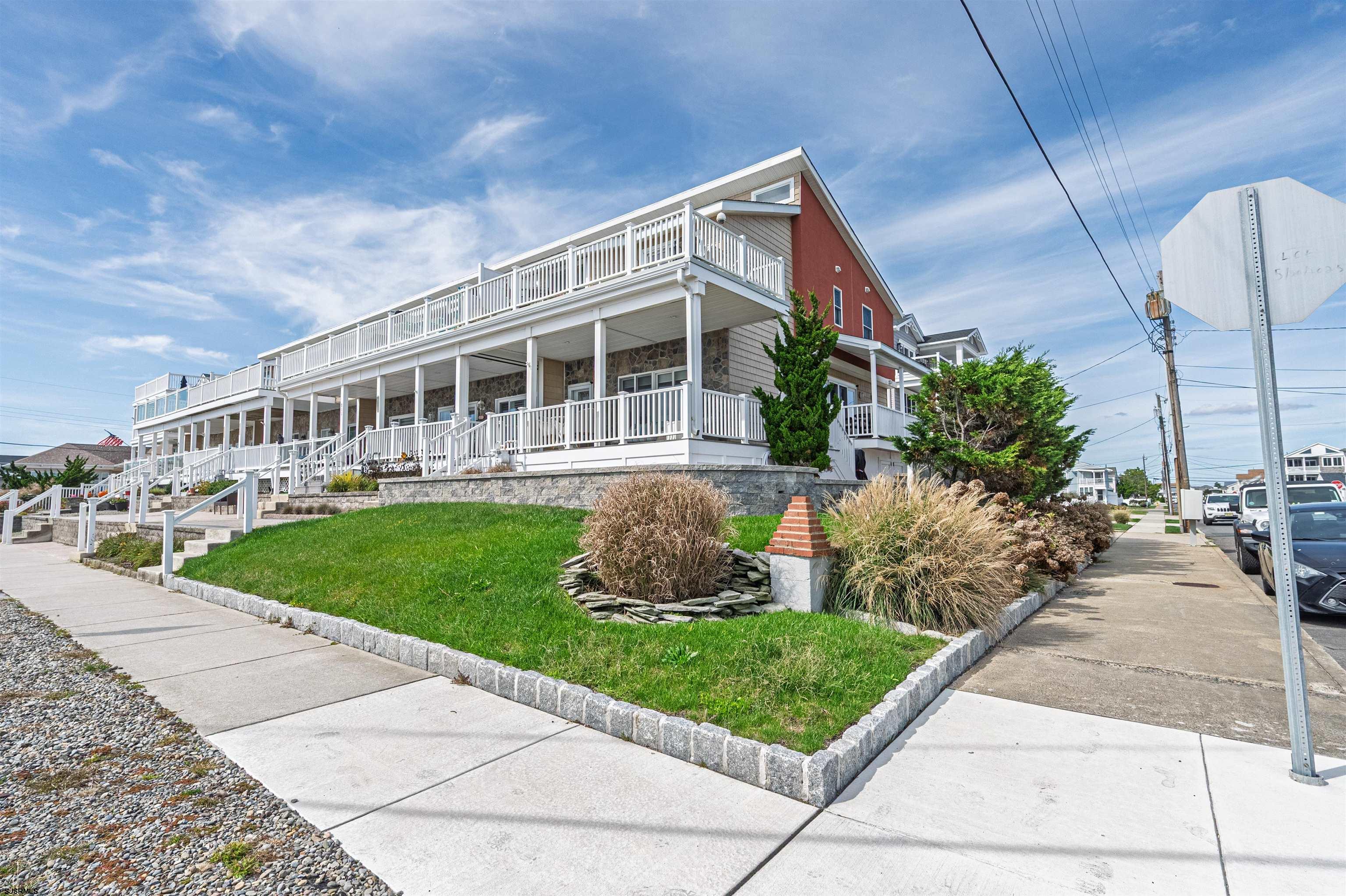 815 East Brigantine Avenue, Unit 7 Brigantine, NJ 08203 - Photo 2 of 31 a view of a house with a yard and plants