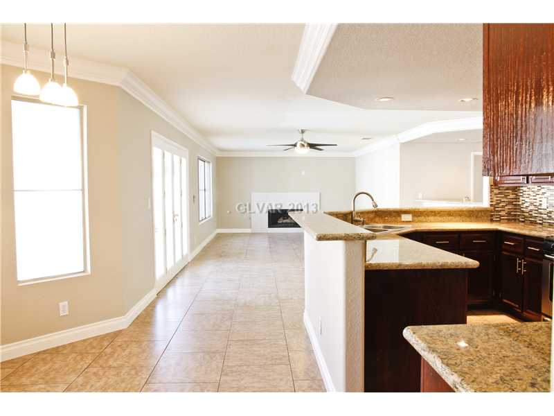 701 Rocky Trail Road Henderson, NV 89014 - Photo 9 of 32 Kitchen. VIEW OF FAMILY ROOM FROM KITCHEN