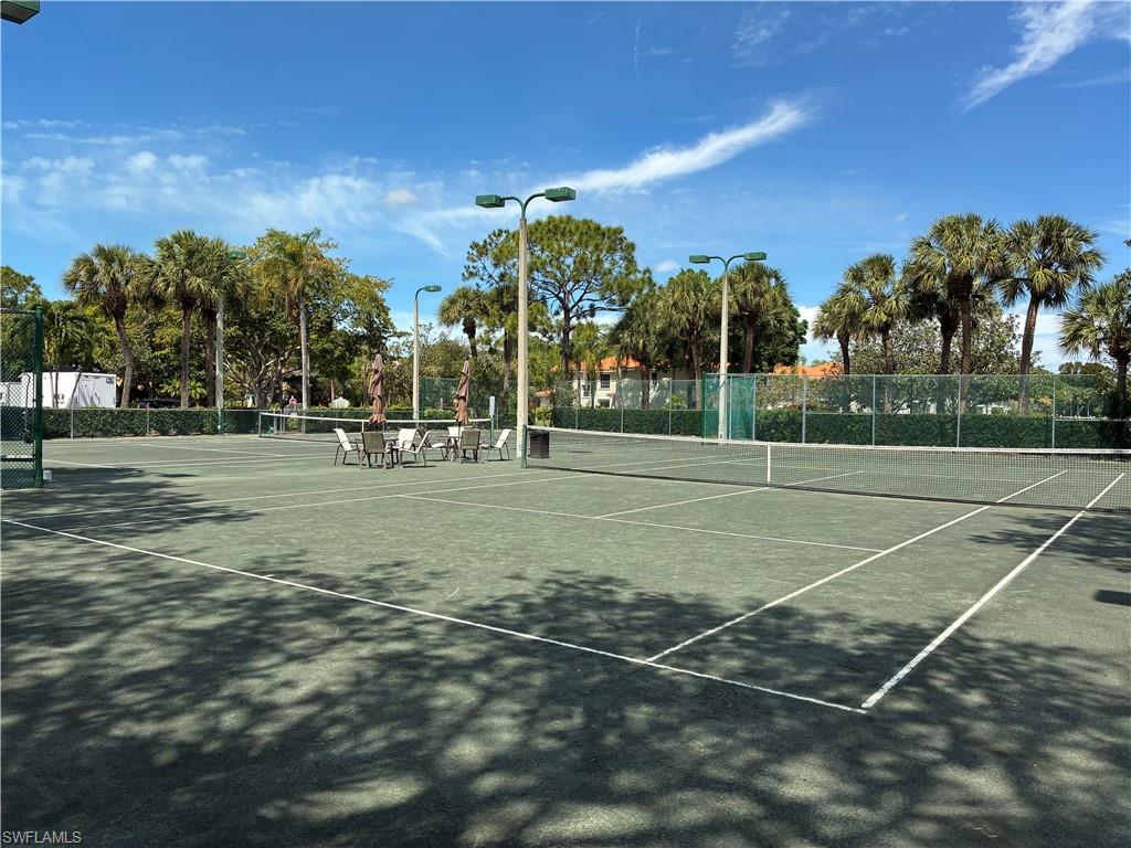 2585 Old Groves Road, Unit L102 Naples, FL 34109 - Photo 29 of 29 a view of a tennis ground