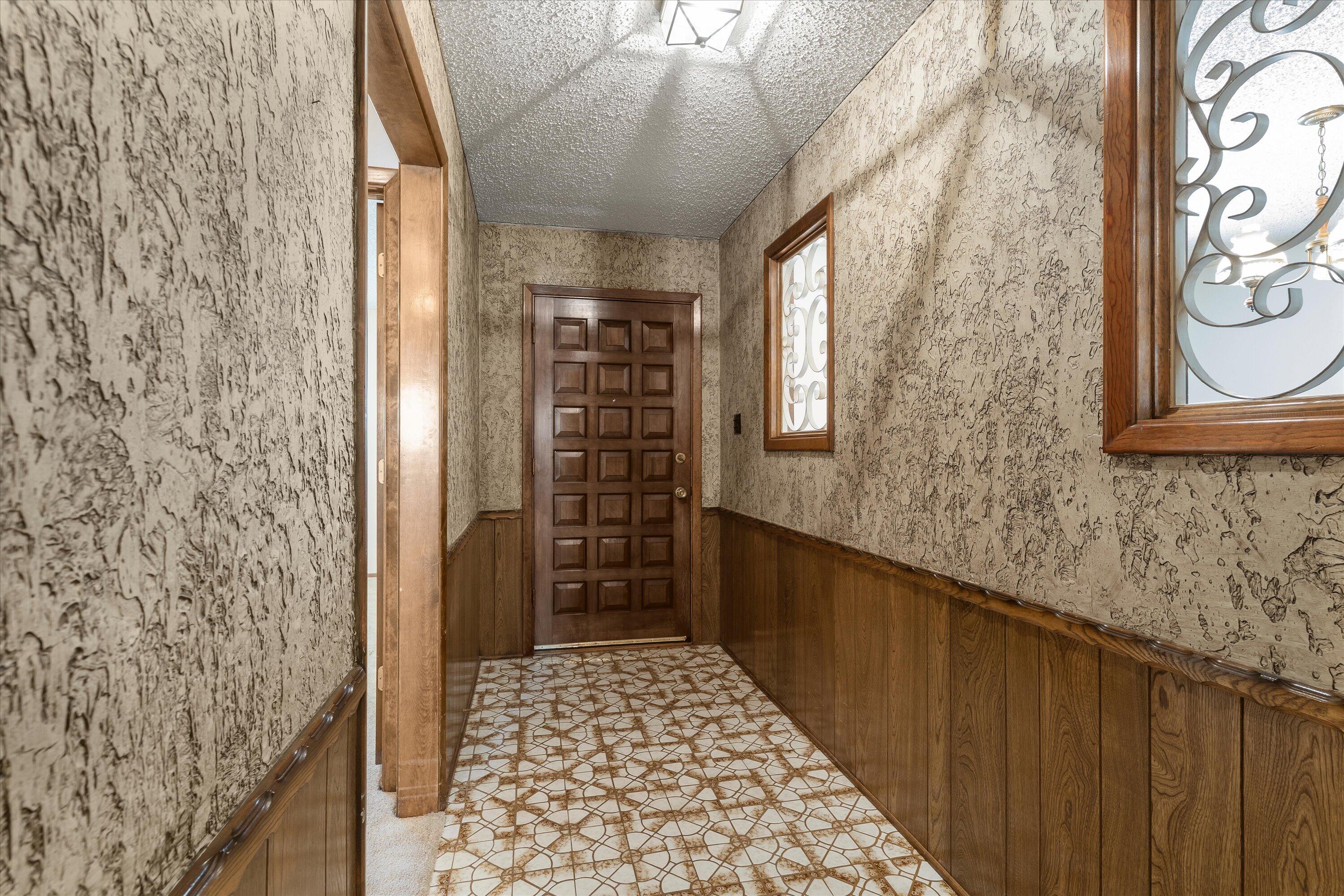 308 West 6th Street Sundown, TX 79372 - Photo 4 of 33 a bathroom with a shower and a mirror