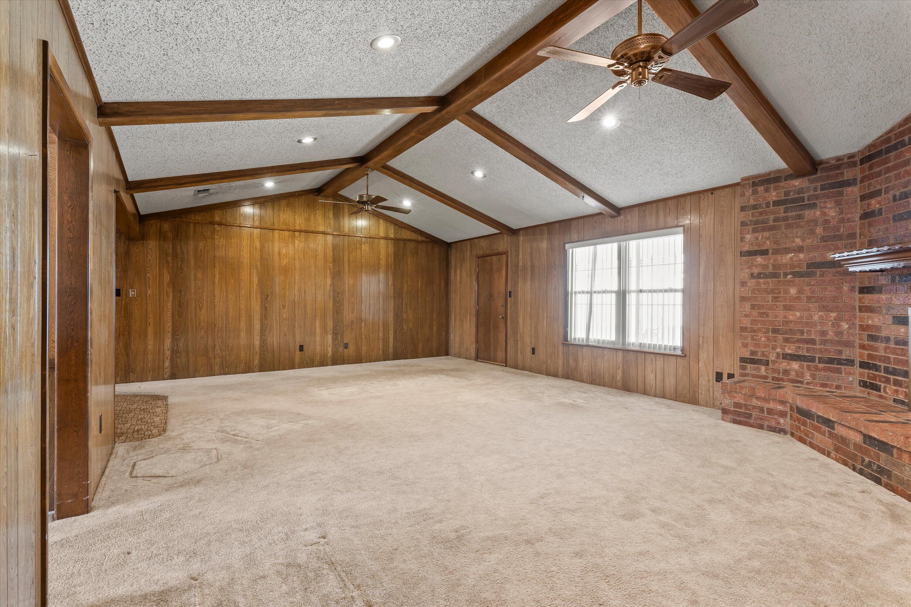 308 West 6th Street Sundown, TX 79372 - Photo 5 of 33 a view of an empty room with a window