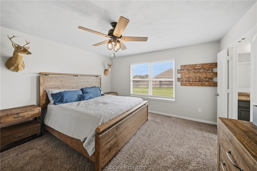 203 36th Ridge Caldwell, TX 77836 - Photo 12 of 31 a spacious bedroom with a bed and a window