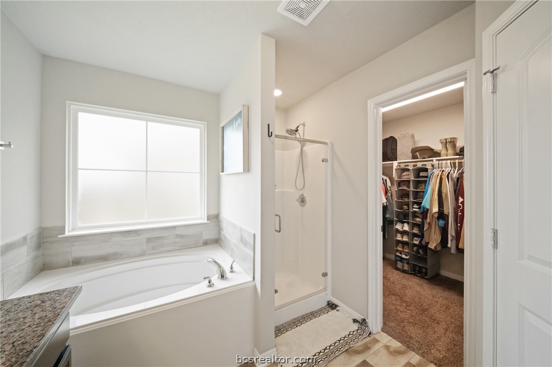203 36th Ridge Caldwell, TX 77836 - Photo 15 of 31 a bathroom with a tub shower and a sink