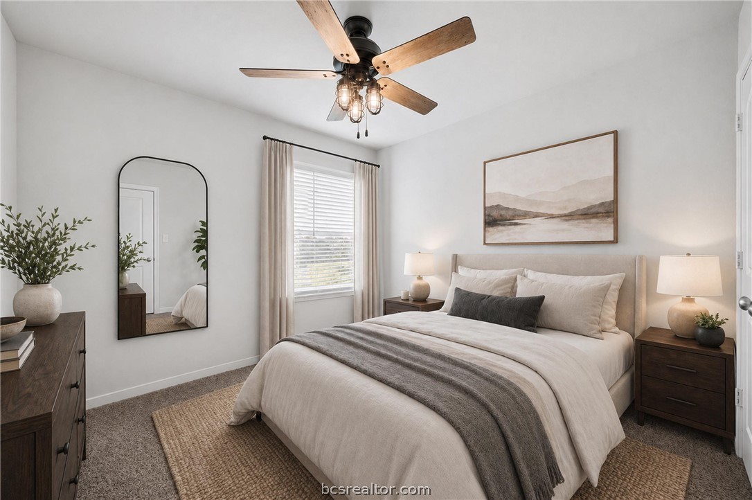 203 36th Ridge Caldwell, TX 77836 - Photo 17 of 31 a bedroom with bed and a chandelier