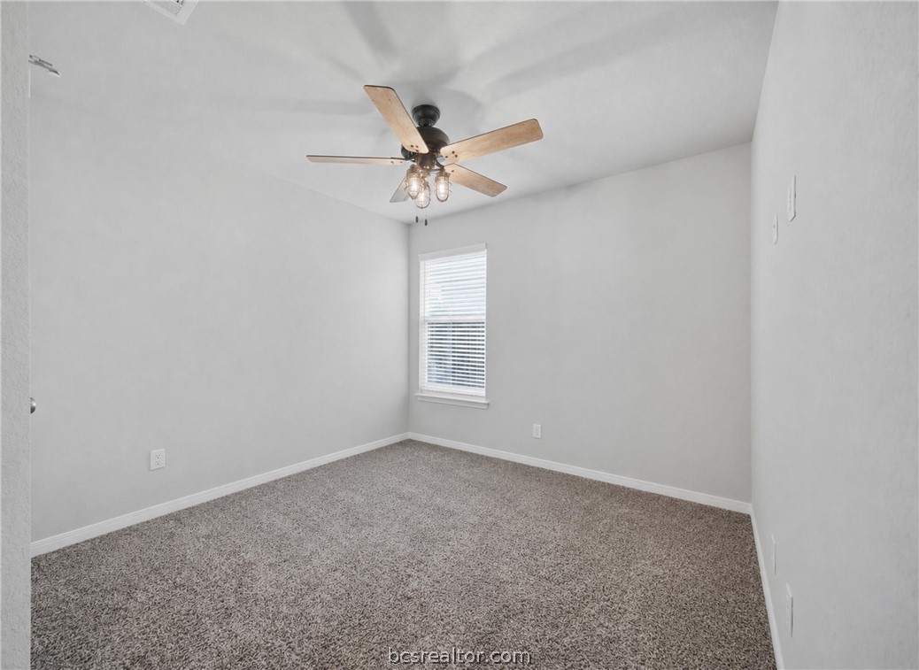 203 36th Ridge Caldwell, TX 77836 - Photo 21 of 31 an empty room with a window and a fan