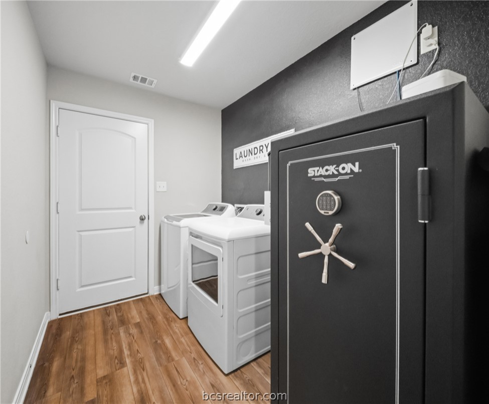 203 36th Ridge Caldwell, TX 77836 - Photo 22 of 31 a utility room with dryer and washer
