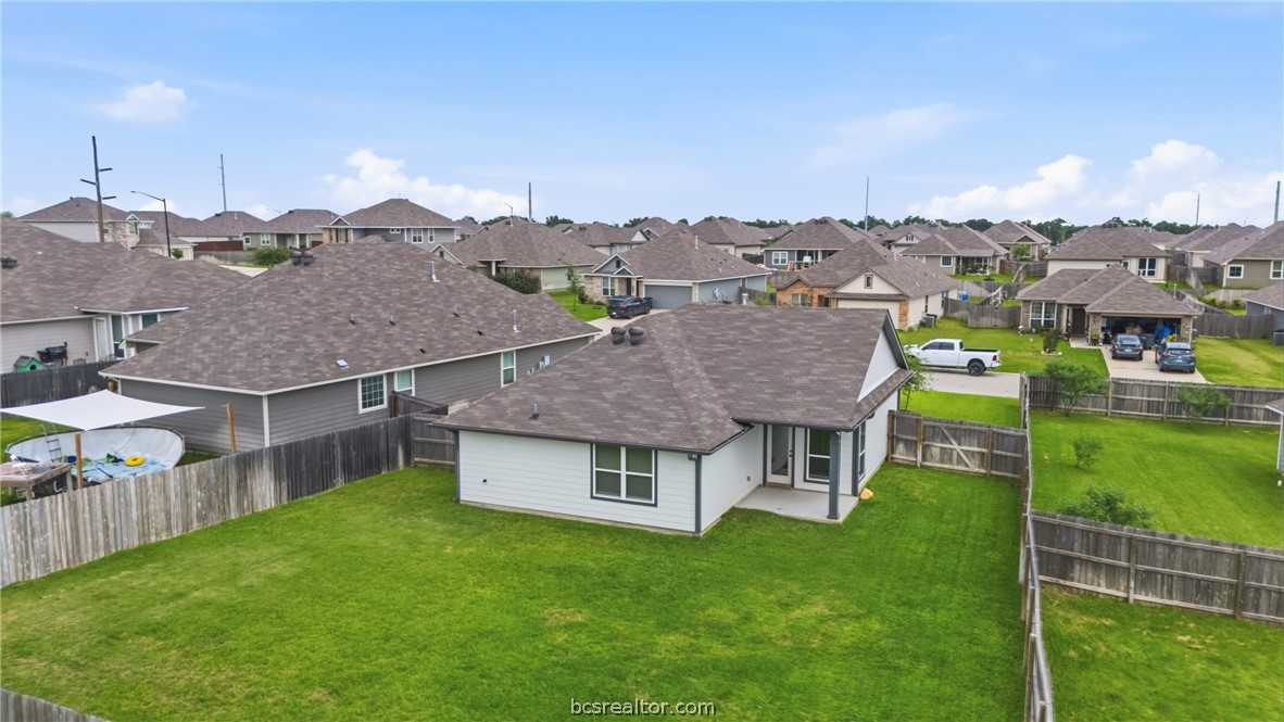 203 36th Ridge Caldwell, TX 77836 - Photo 26 of 31 a aerial view of a house with a big yard and large trees