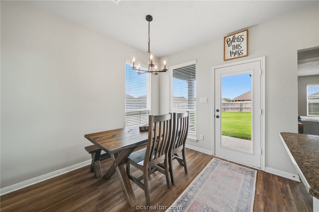203 36th Ridge Caldwell, TX 77836 - Photo 7 of 31 a view of a dining room with furniture window and wooden floor
