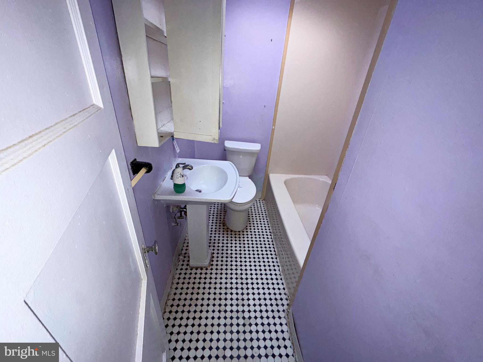 44 North Athol Avenue Baltimore, MD 21229 - Photo 13 of 18 a view of a hallway with furniture