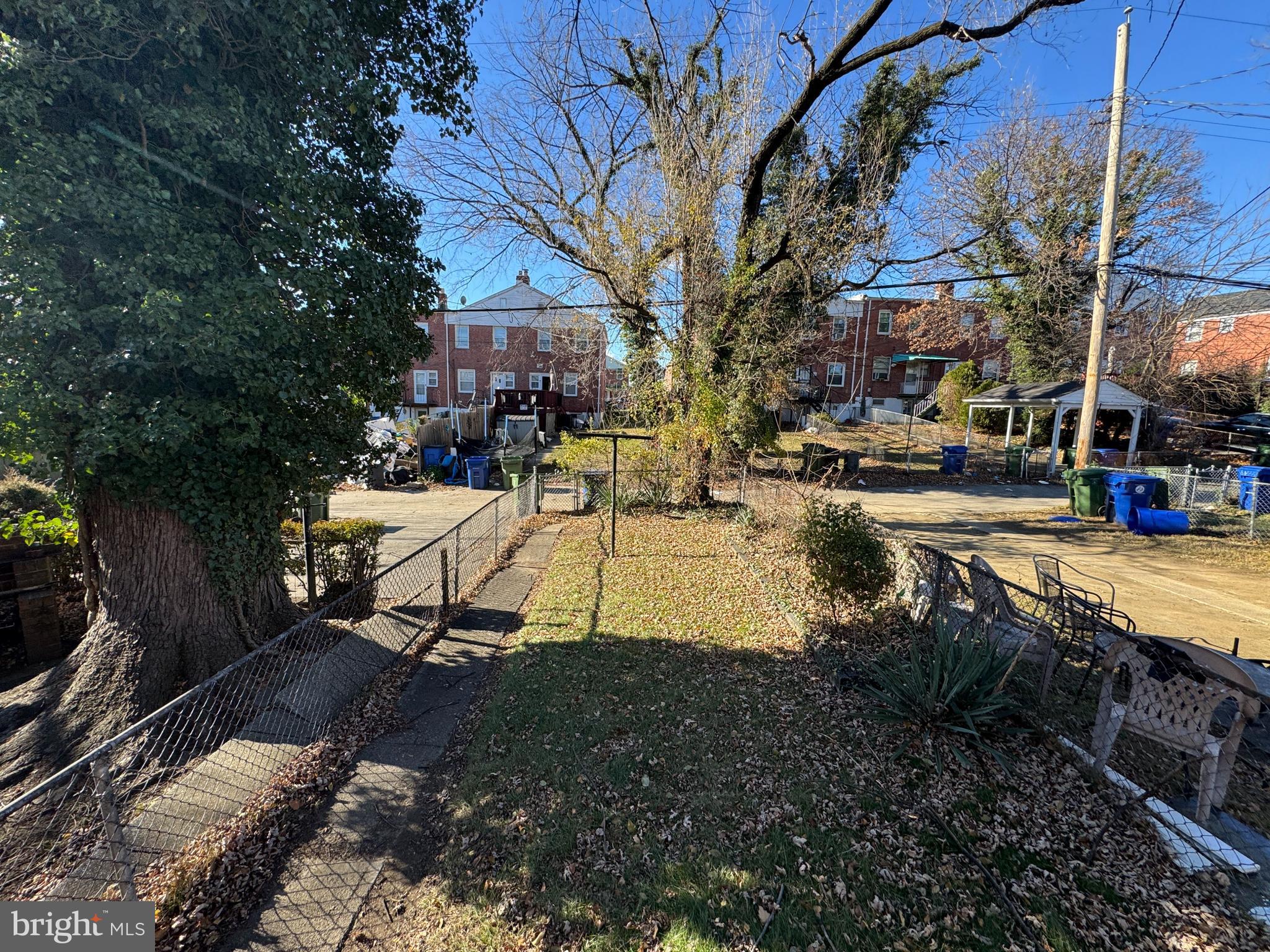 44 North Athol Avenue Baltimore, MD 21229 - Photo 4 of 18 a view of a swimming pool with a patio