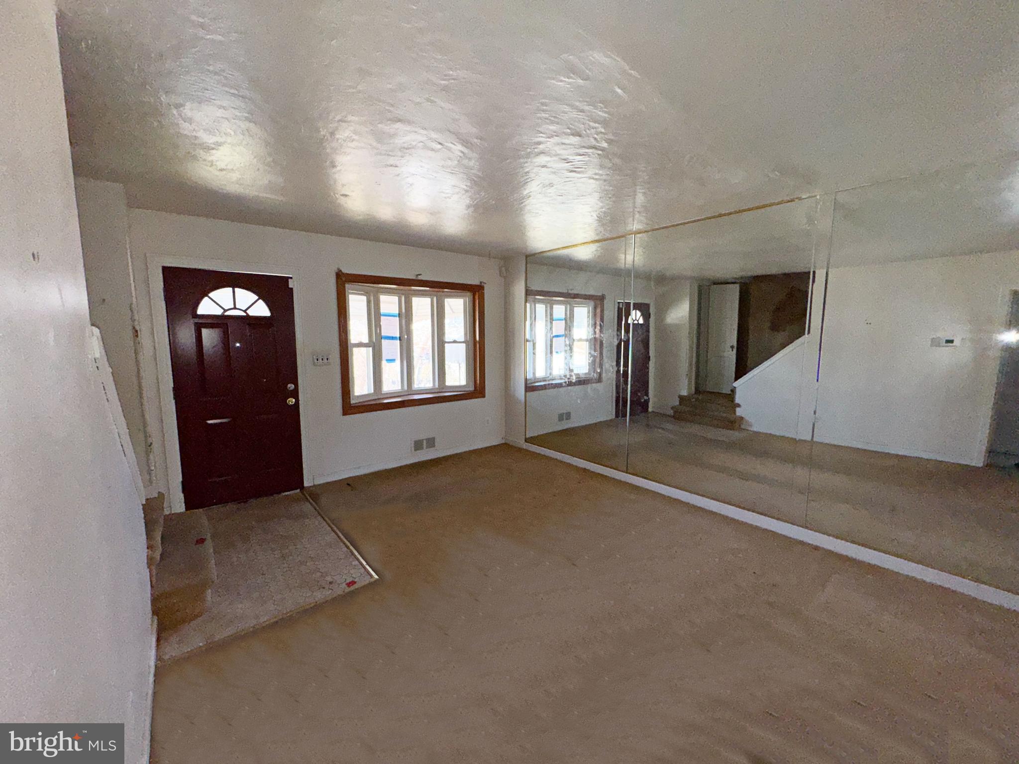 44 North Athol Avenue Baltimore, MD 21229 - Photo 5 of 18 an empty room with windows