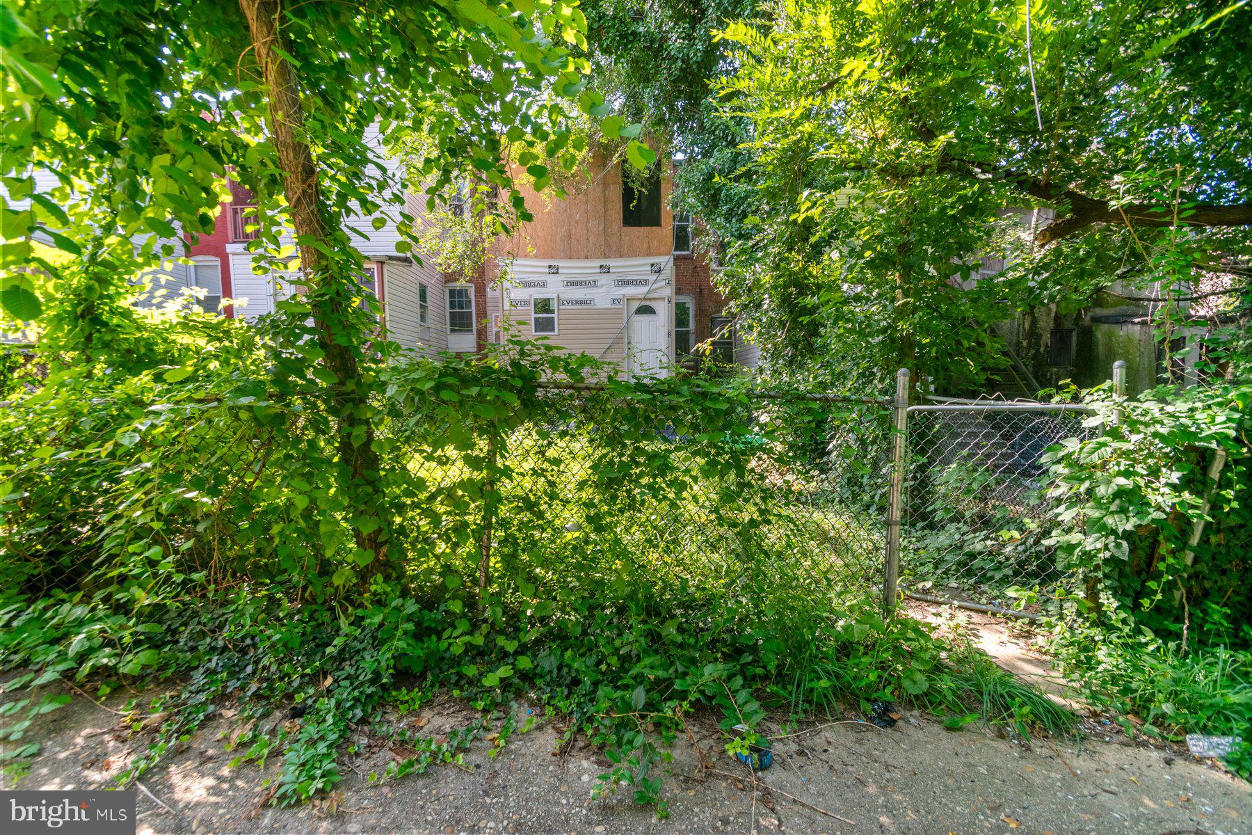 2906 Violet Avenue Baltimore, MD 21215 - Photo 30 of 30 an aerial view of a house with a yard