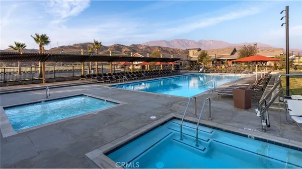 a view of a swimming pool with a mountain