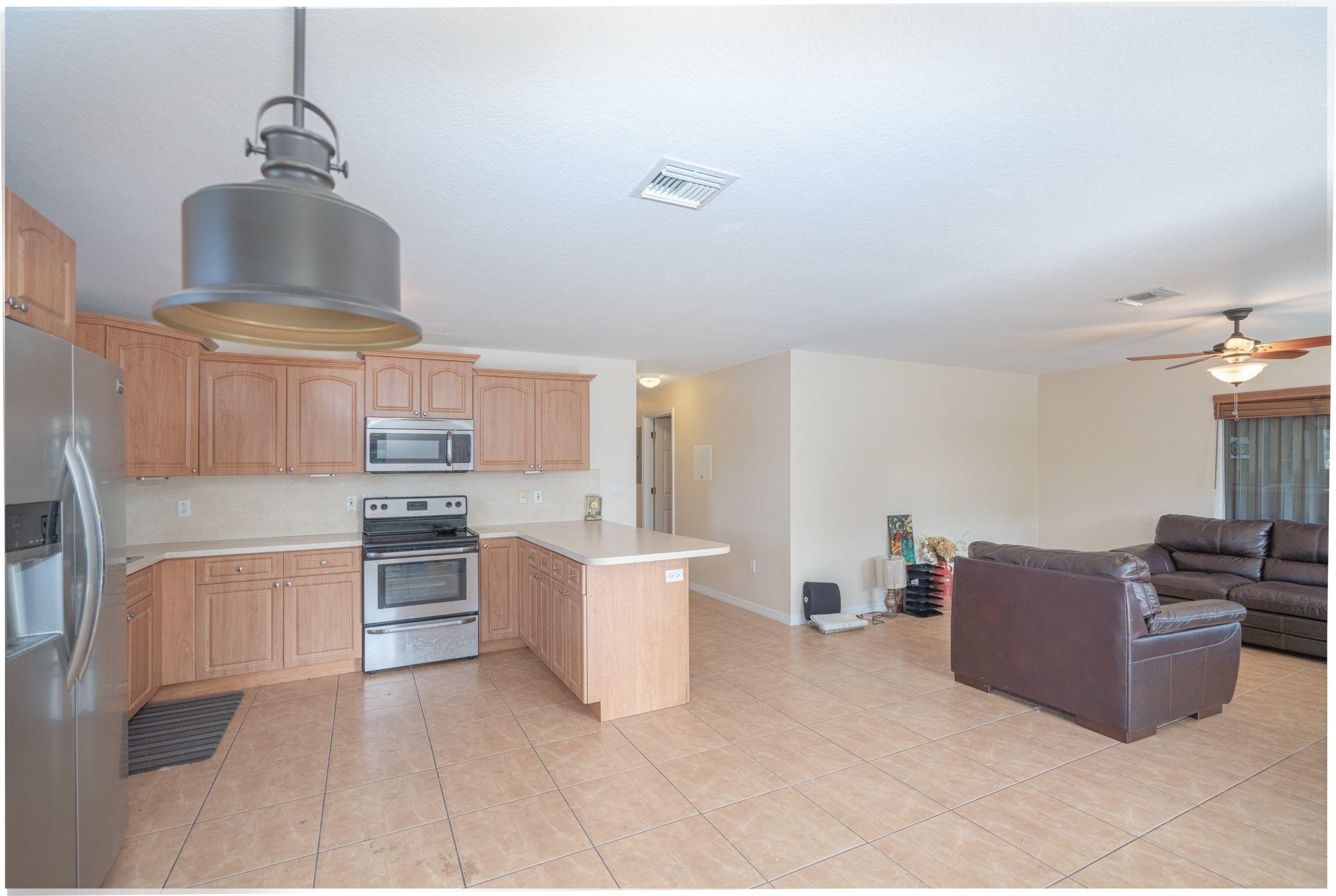 20 North End Road Key Largo, FL 33037 - Photo 14 of 23 kitchen to living