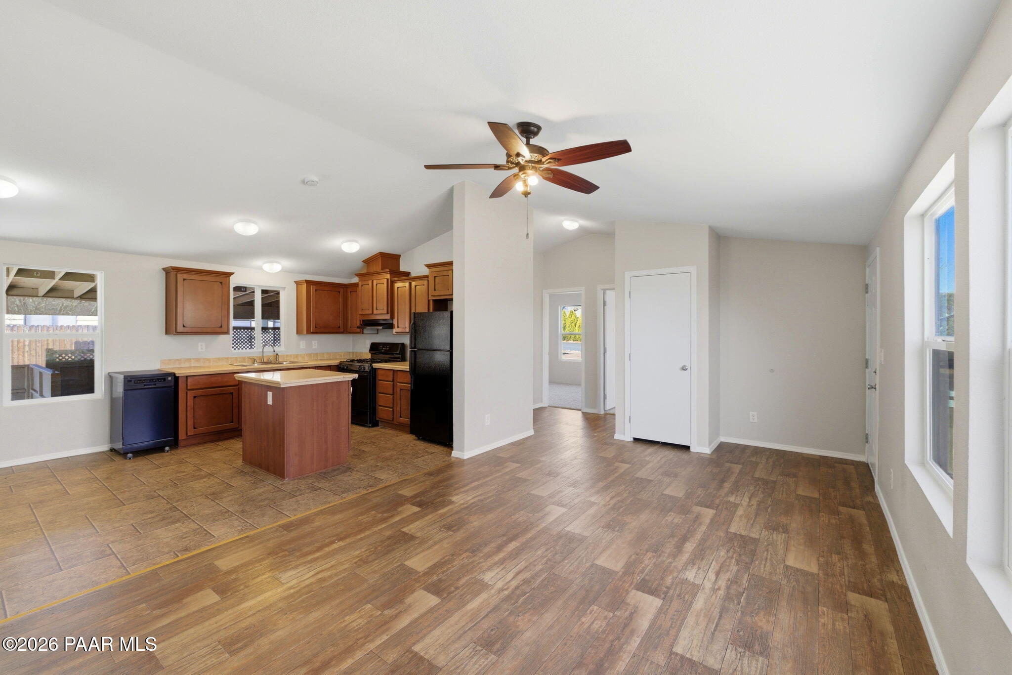10397 East Durham Road Dewey, AZ 86327 - Photo 17 of 40 a view of a kitchen with a sink cabinets and window