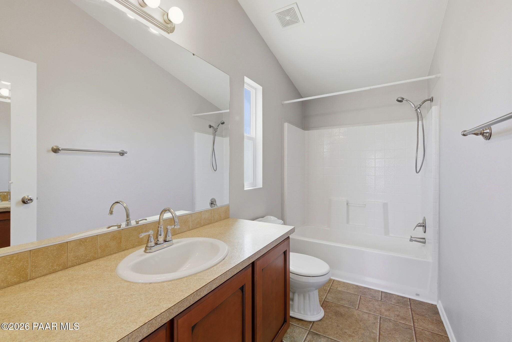 10397 East Durham Road Dewey, AZ 86327 - Photo 21 of 40 a bathroom with a granite countertop sink toilet a shower and a mirror