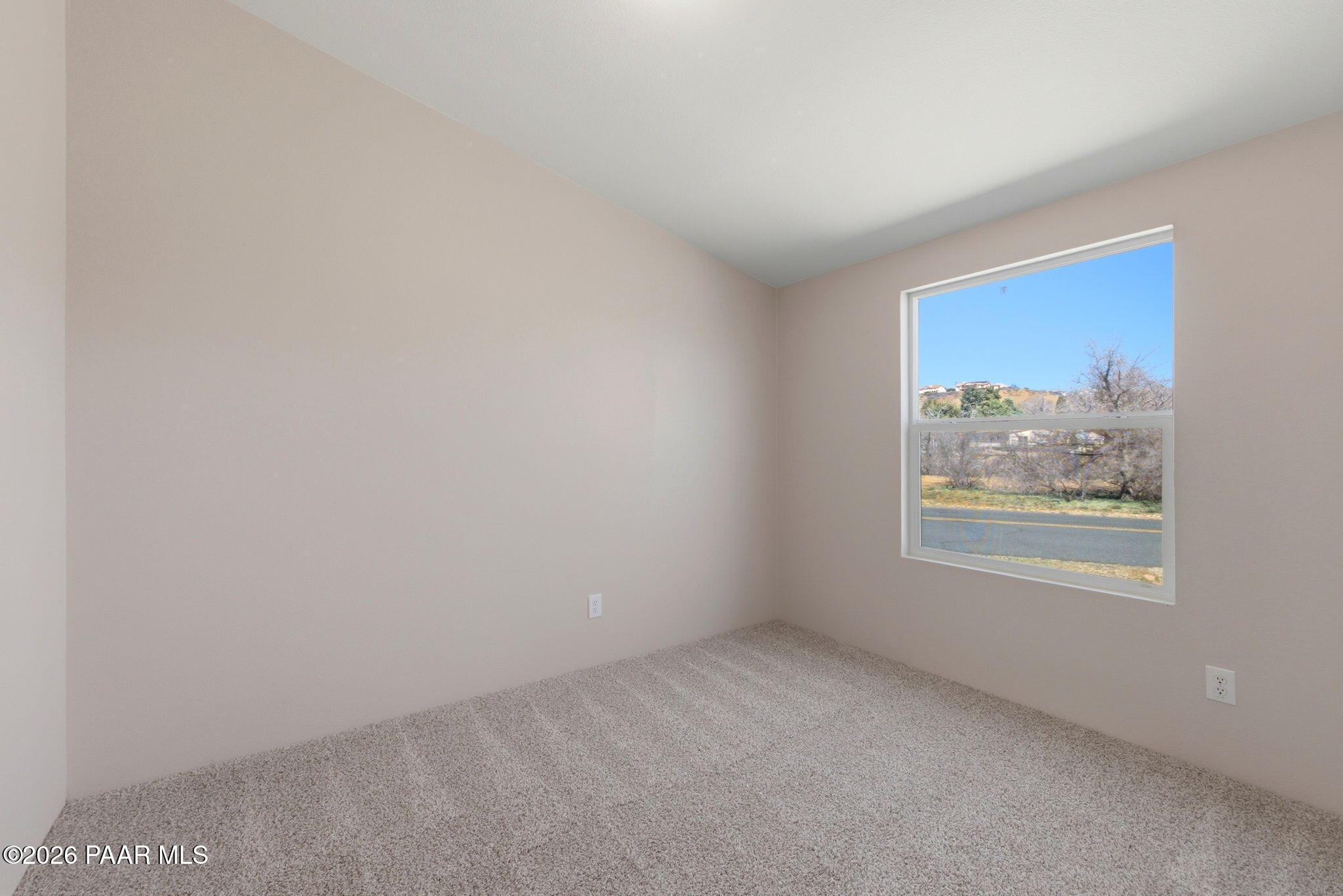 10397 East Durham Road Dewey, AZ 86327 - Photo 24 of 40 an empty room with a window